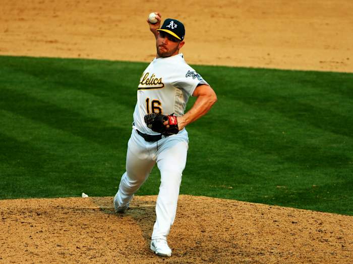 Oct 1, 2020; Oakland, California, USA; Oakland Athletics relief pitcher Liam Hendriks (16) pitches the ball during the ninth inning against the Chicago White Sox at Oakland Coliseum.